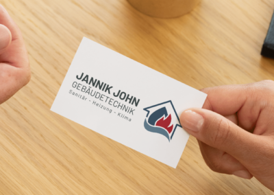 Logo „John Gebäudetechnik“